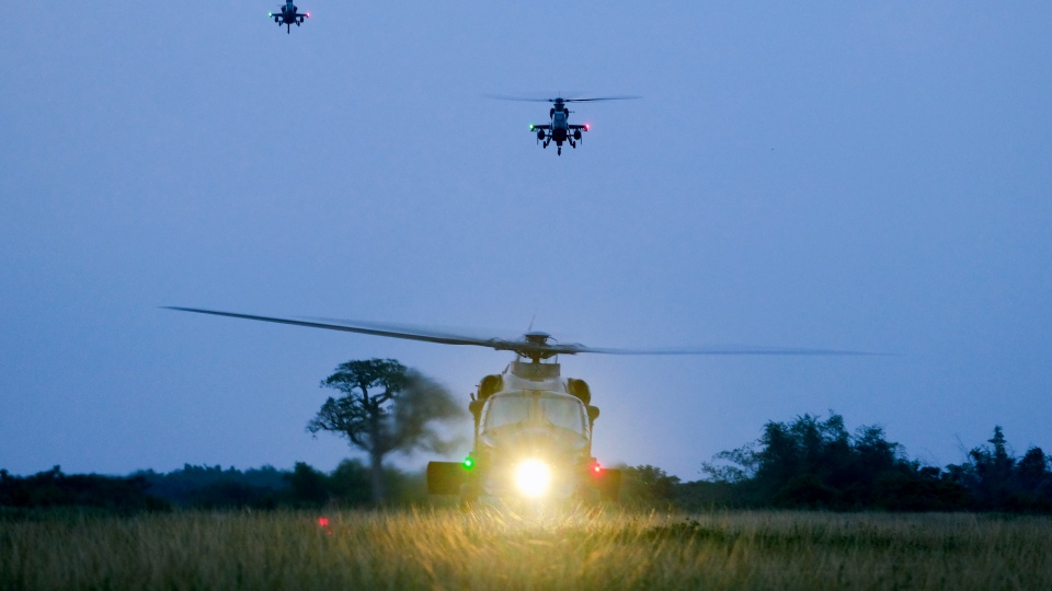 Multiple helicopters participate in flight training